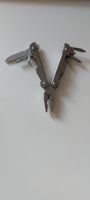Multitool with pliers knife ruler used