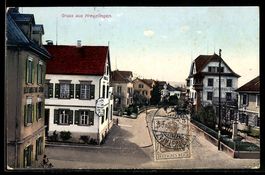 AK Kreuzlingen, Strassenansicht mit Häusern und Denkmal aus 