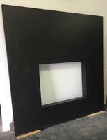 Face de cheminée en granit noir absolu flammé et brossé