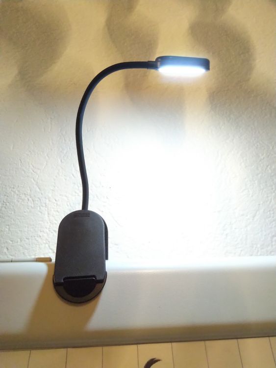 Prios LED-Klemmleuchte Najari, schwarz, Akku, USB, dimmbar