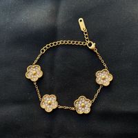 18KGP Zirkonia Blume Armkette