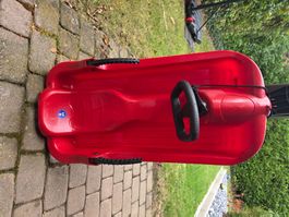 ALPEN Kinderschlitten mit Lenkrad und Bremse – rot