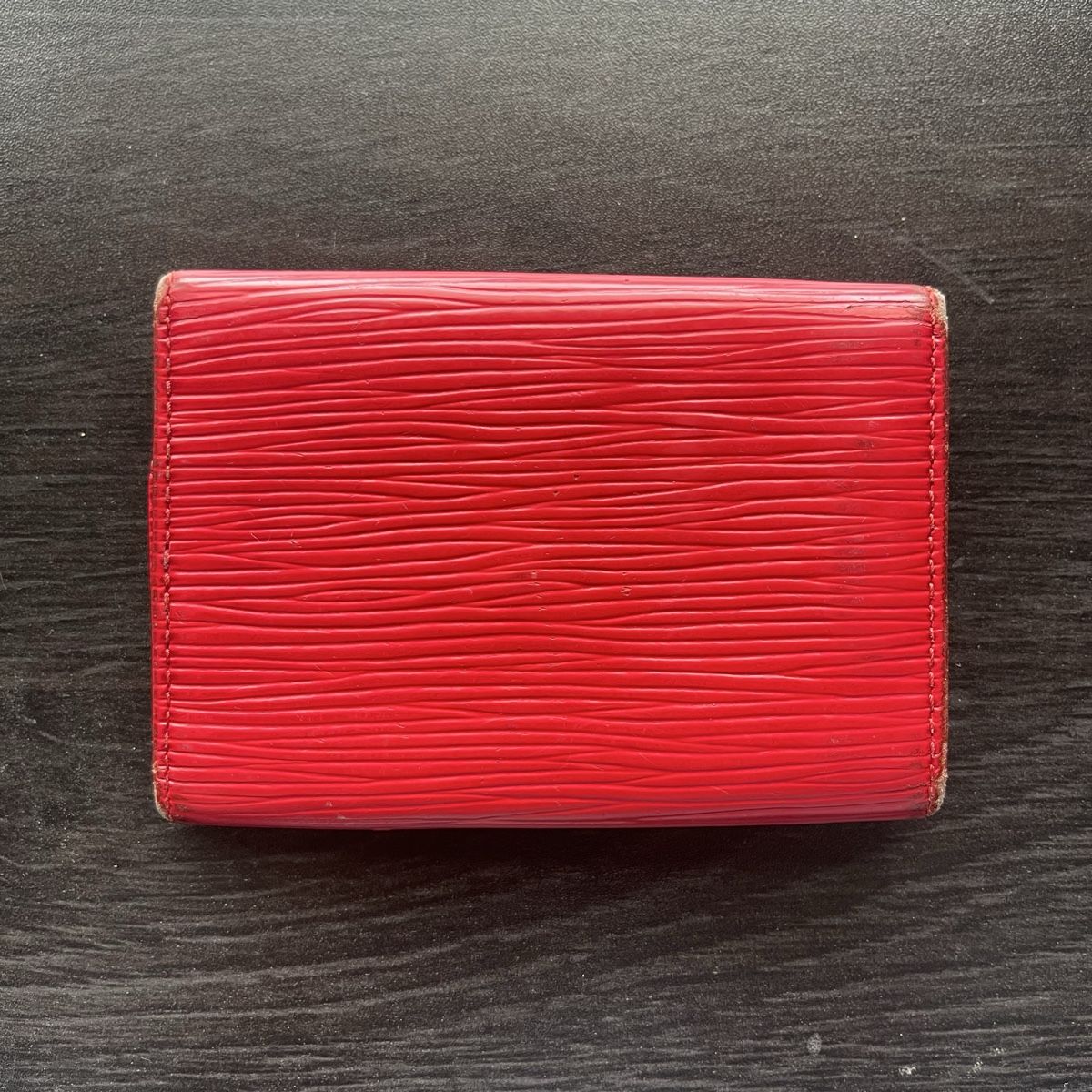 Louis Vuitton Portafogli: Vintage Louis Vuitton red key holder – Usato da Genève venduto da FoundTears 1