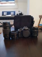Canon 550D + 18-55mm + 75-300mm + 50mm 1.8 + sac photo.