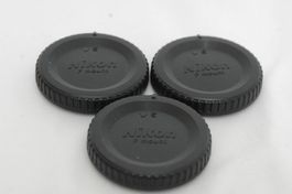 3x Nikon Deckel für Kamera