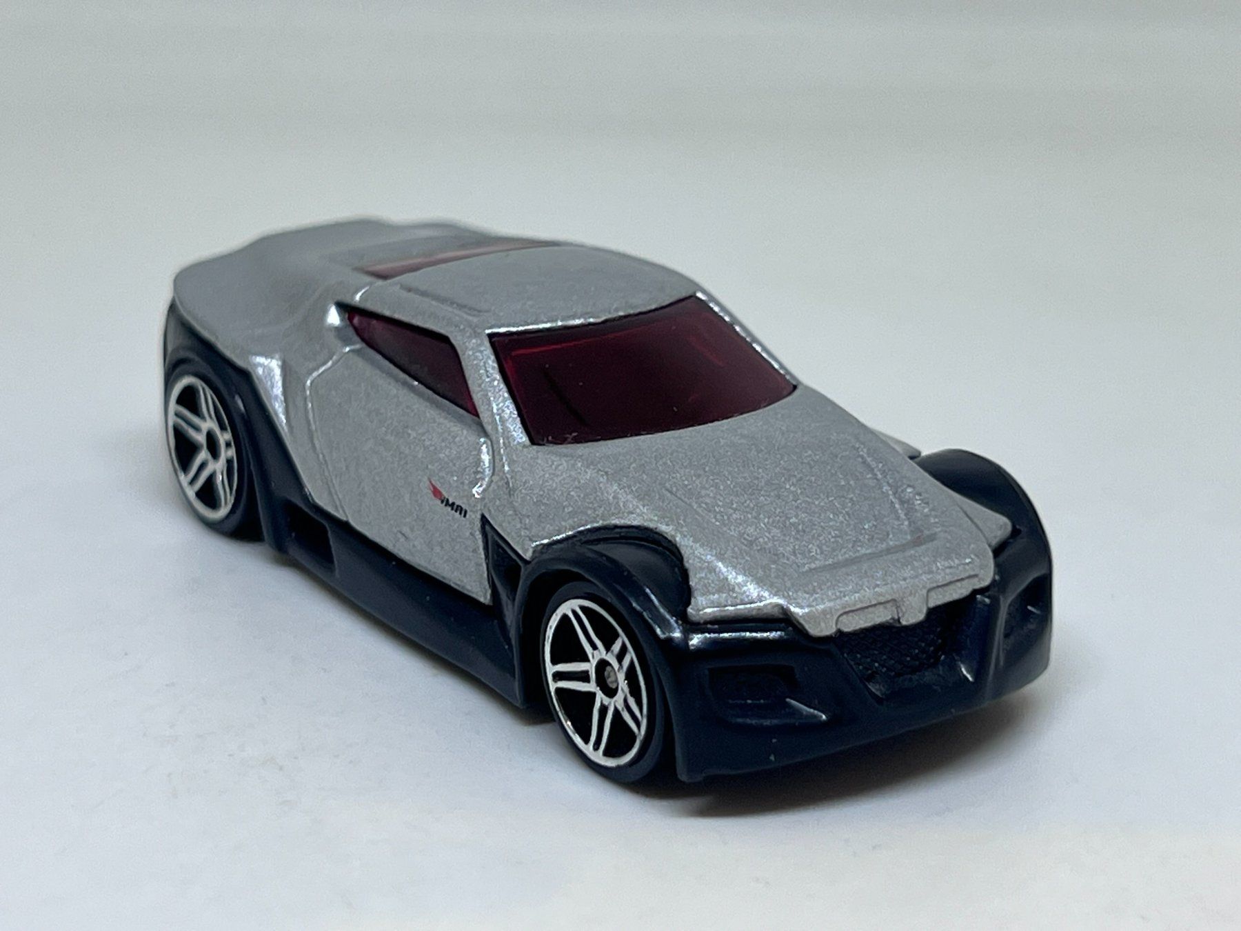 Hot Wheels Modellautos: Hot Wheels Symbolic #571 – Gebraucht aus Wildegg von LaaBoutique