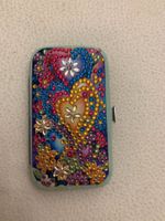 Nagelset mit Glitzersteinchen besetzt
