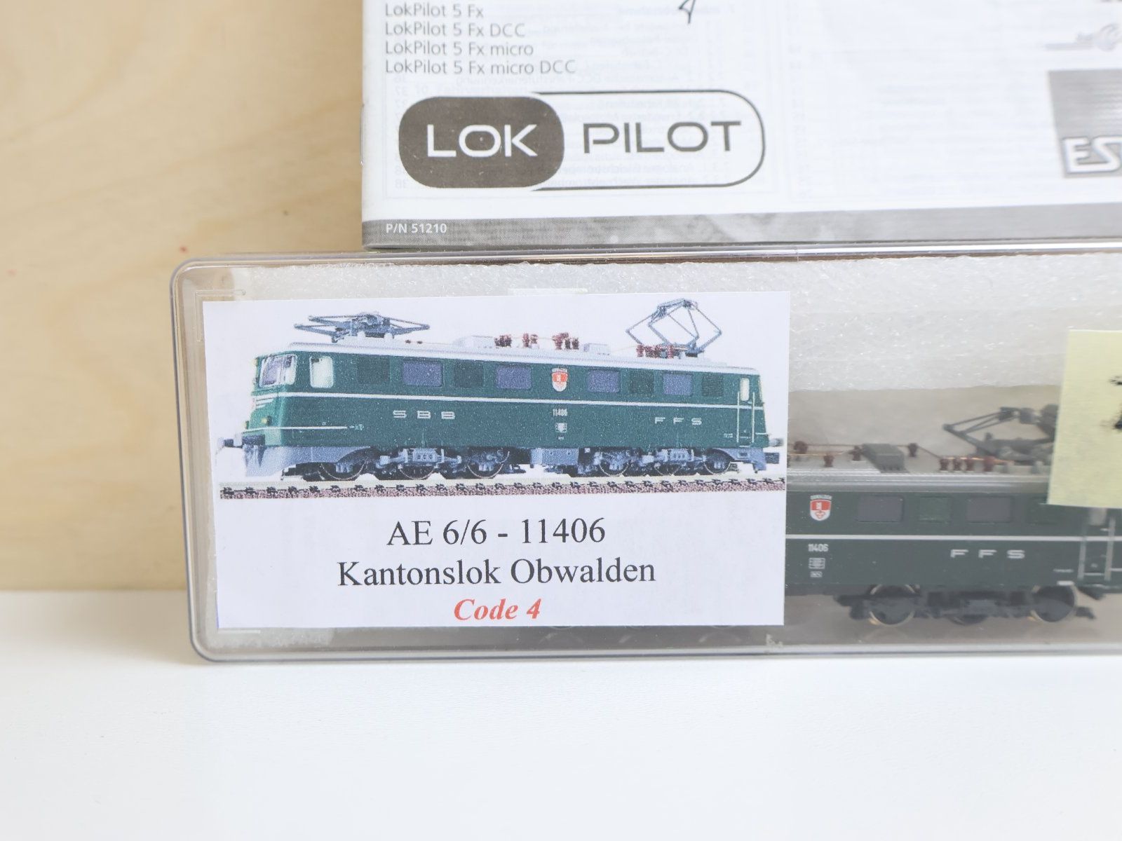 Trix Modellini di ferrovie: Minitrix SBB Ae 6/6 E-Lok "Obwalden"- ESU V5 Digital Spur N – Difettoso da Winterthur venduto da Monstera