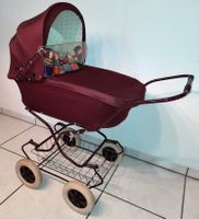 Puppenwagen aus den 60er Jahren mit Puppe