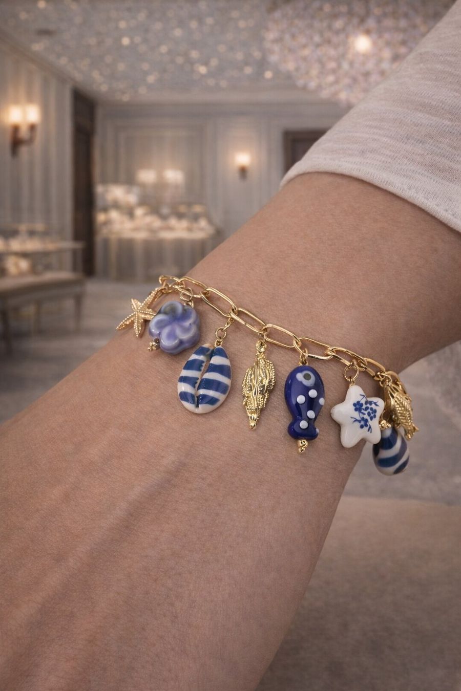 Bracciali & Braccialetti: Bracciale charm oro stile mare con conchiglie e stelle – Nuovo e nell'imballaggio originale da Lugano venduto da solowolford