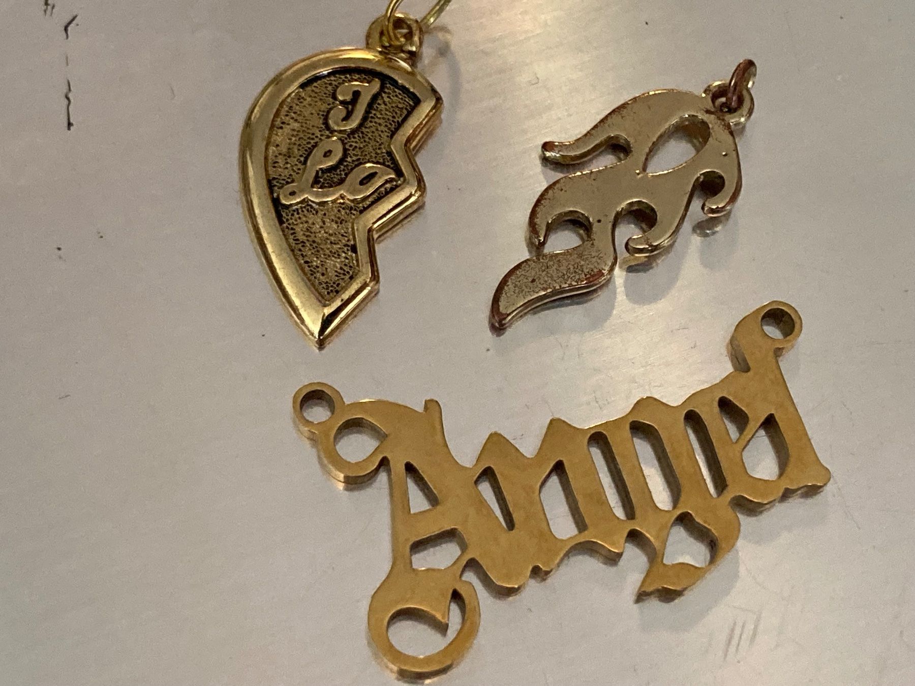 Ciondoli: Pendentifs en métal argenté et doré – Usato da Marly venduto da Antigona71 4