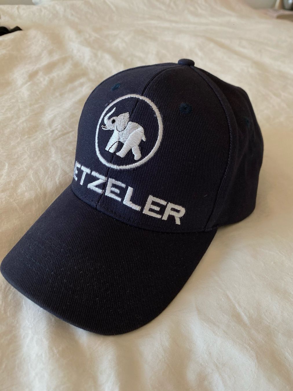 Copricapi, berretti & cappellini: Casquette Metzeler bleu – Usato da St-Blaise venduto da Windy2