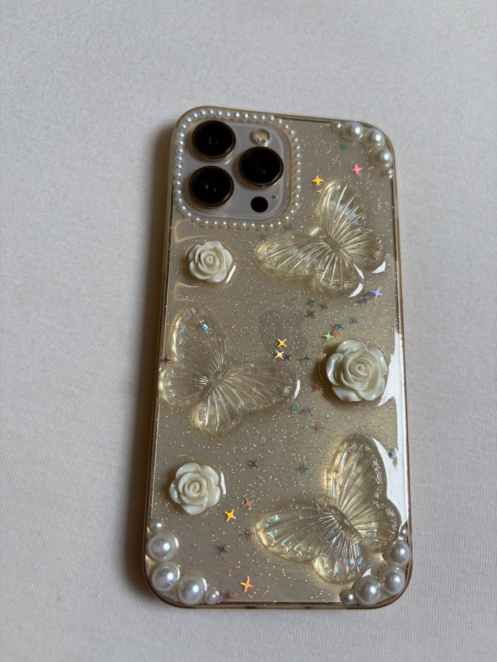 Apple Coques & Protection écran: iPhone 13 Pro Max Glitzer-Hülle mit Schmetterlingen & Perlen – Neuf (Voir description) à Neuendorf par jas_j5nc 1