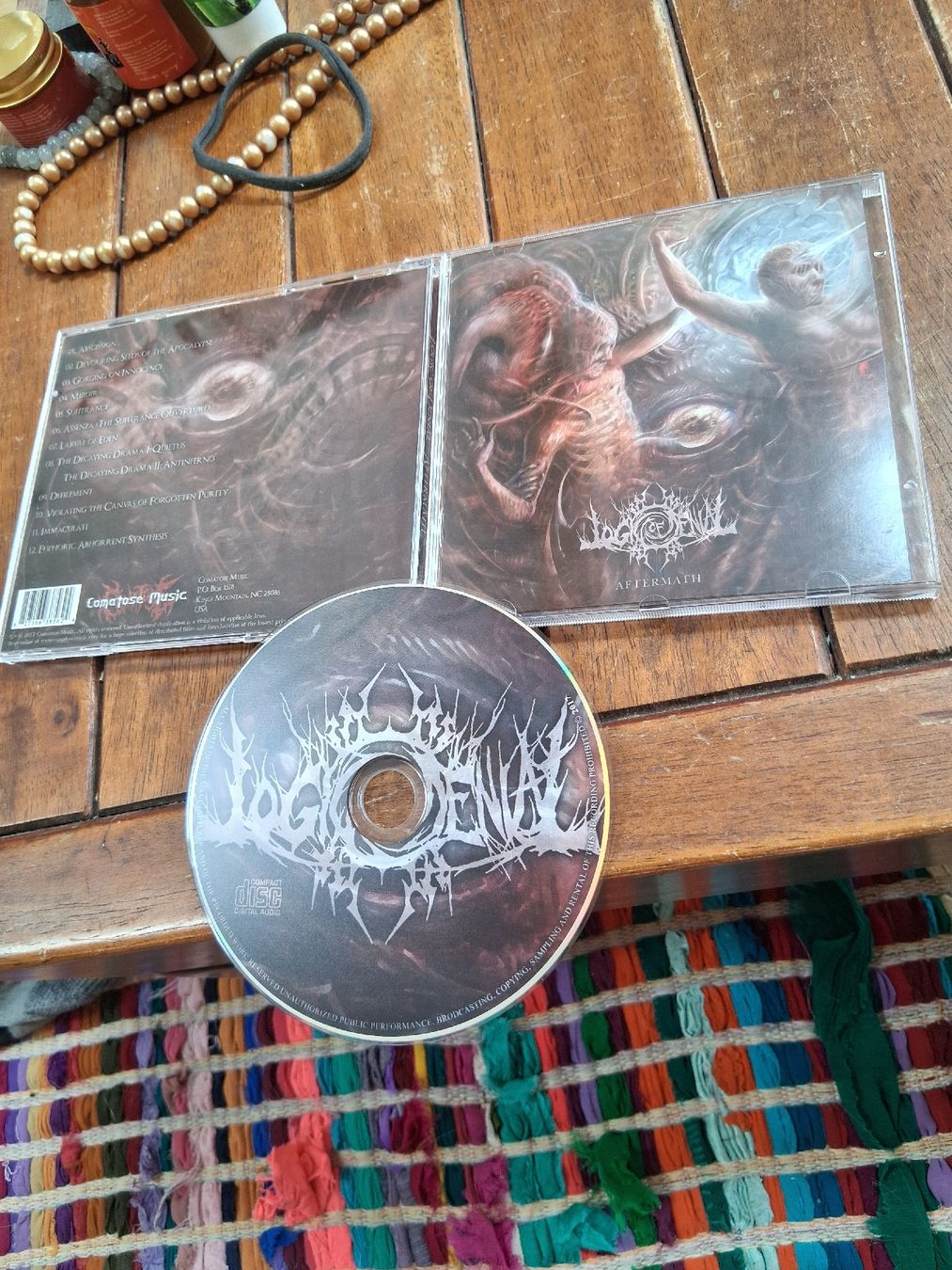 CDs: logic of denial- aftermath – D'occasion à St-Cergue par VeganWarrior