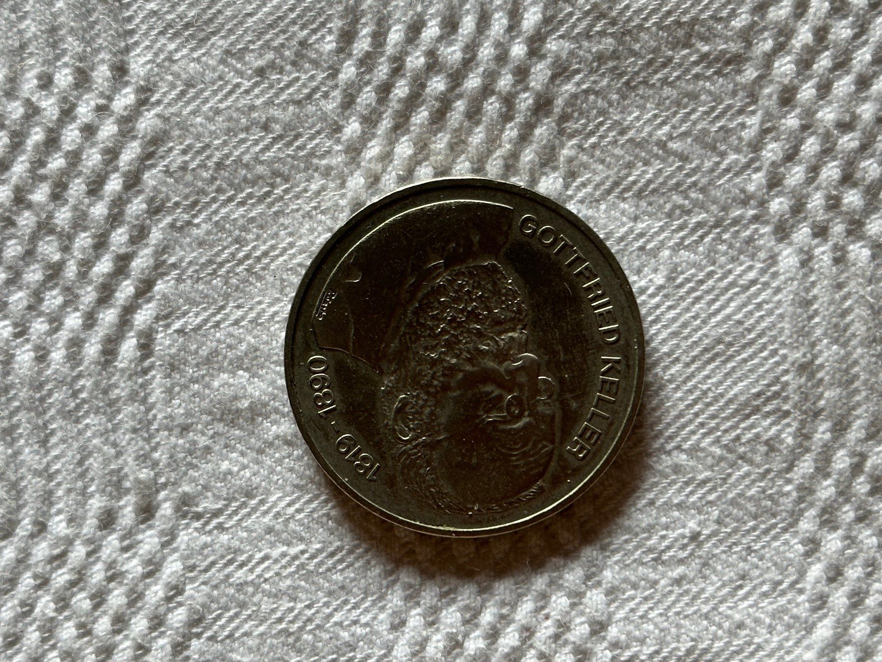Alle Münzen: Pièce 5CHF de 1990 Gottfried Keller – Gebraucht aus Ste-Croix von mjmg