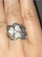 Elegant Sterling Silver Flower Ring with Black Accents