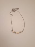 Petit bracelet doré gravé avec "make a wish"