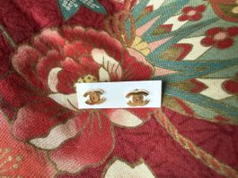 Goldfarbene Ohrstecker Doppel-C Design
