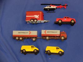 Modellauto und Helikopter