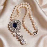 Collier Perles eau douce et pendentif saphir