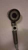 Showerhead with filter and one cartridge for hard water
