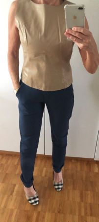 Blazer, der mit einem Gilet aus Echtleder