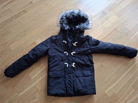 Winterjacke schwarz mit Kapuze neu Grösse 164/170