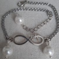 Modisches Armband mit Unendlichkeitszeichen und Perlen