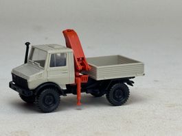 VE1- Roco Mercedes Unimog mit Ladekran grau