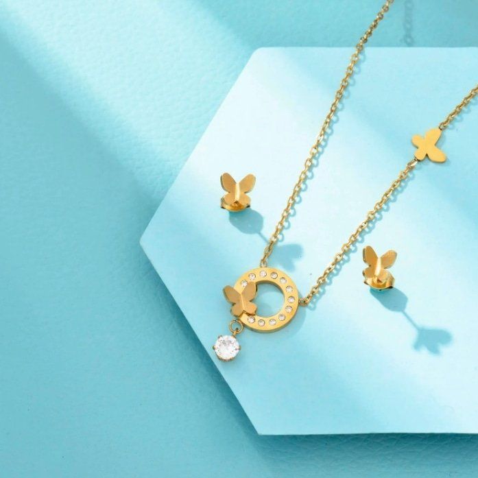 Catenine: Schmuckset golden butterfly – Nuovo e nell'imballaggio originale da Zürich venduto da Schnaeppchen_for_her