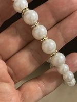 Bracelet perles blanches avec strass.neuf unisexes