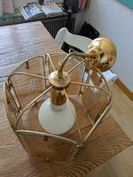 Goldene Glaslampe mit  Glasgravuren