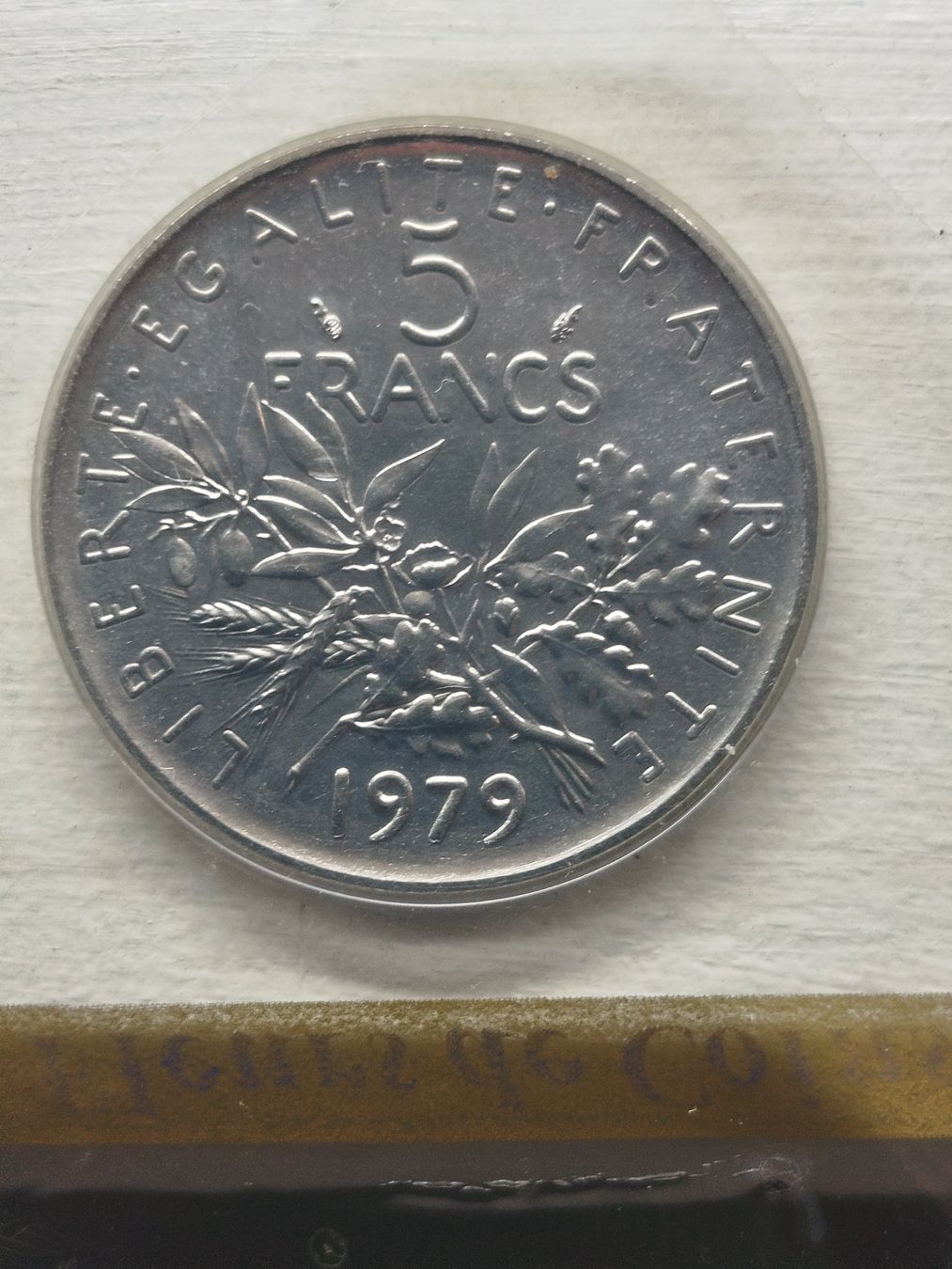 Tutti le monete: 5 FRANCS SEMEUSE  1979 – Nuovo e nell'imballaggio originale da Wettingen venduto da Colorup
