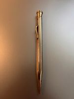 Porte mines argenté avec marque SPINEDI