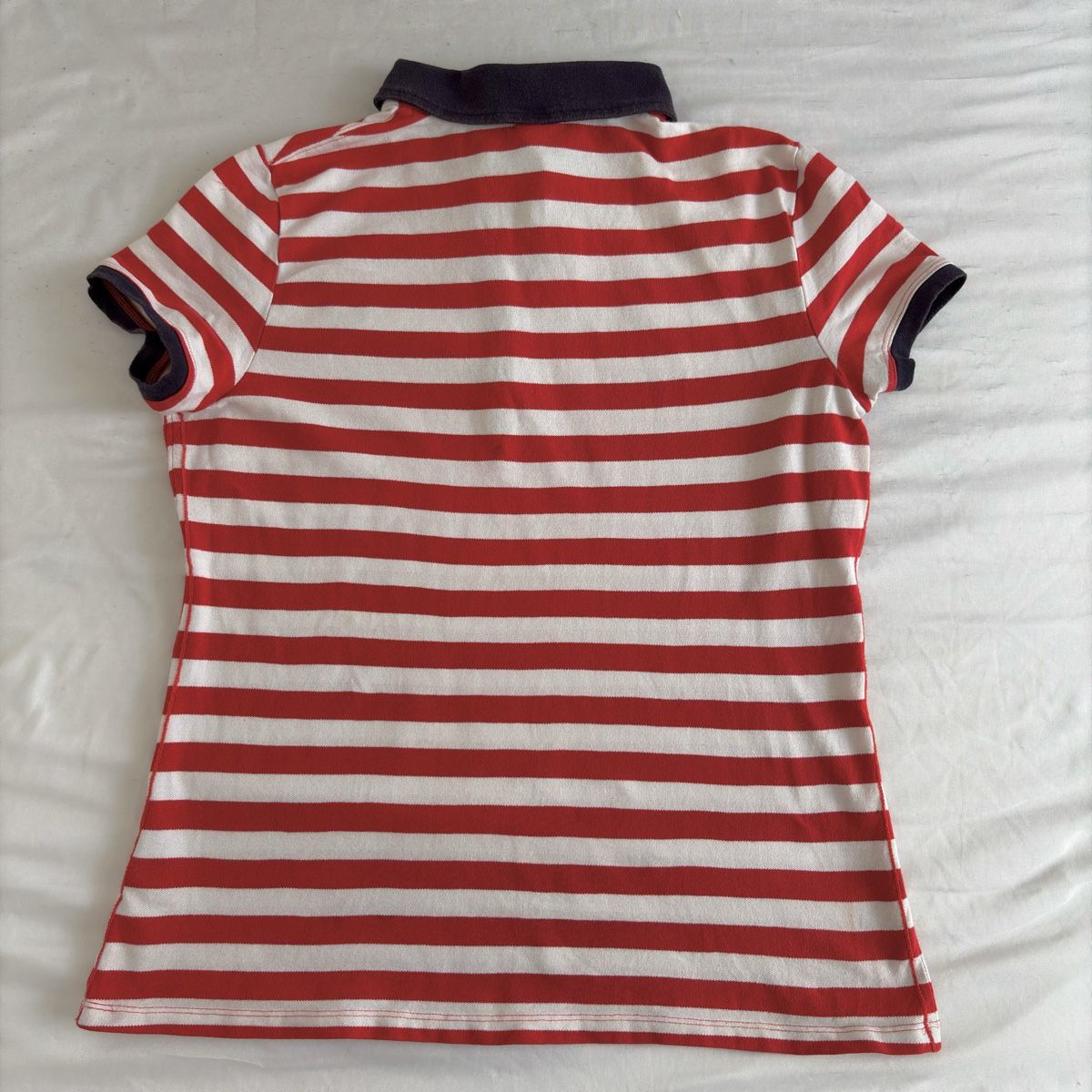 Puma Magliette Polo: Polo rayé rouge et blanc Puma – Usato da Moudon venduto da TigerrrEye 1