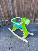 Schaukelpferd Dino Holz grün Kinder Spielzeug guter Zustand