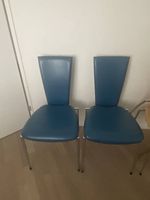 6 farbige Lederstühle