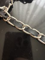 Handyhülle Kette, schwarz / silber geflochten