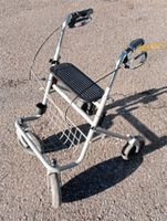 Déambulateur 4 roues avec siège et panier - Occasion