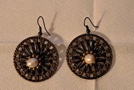 Boucle d oreille avec perle