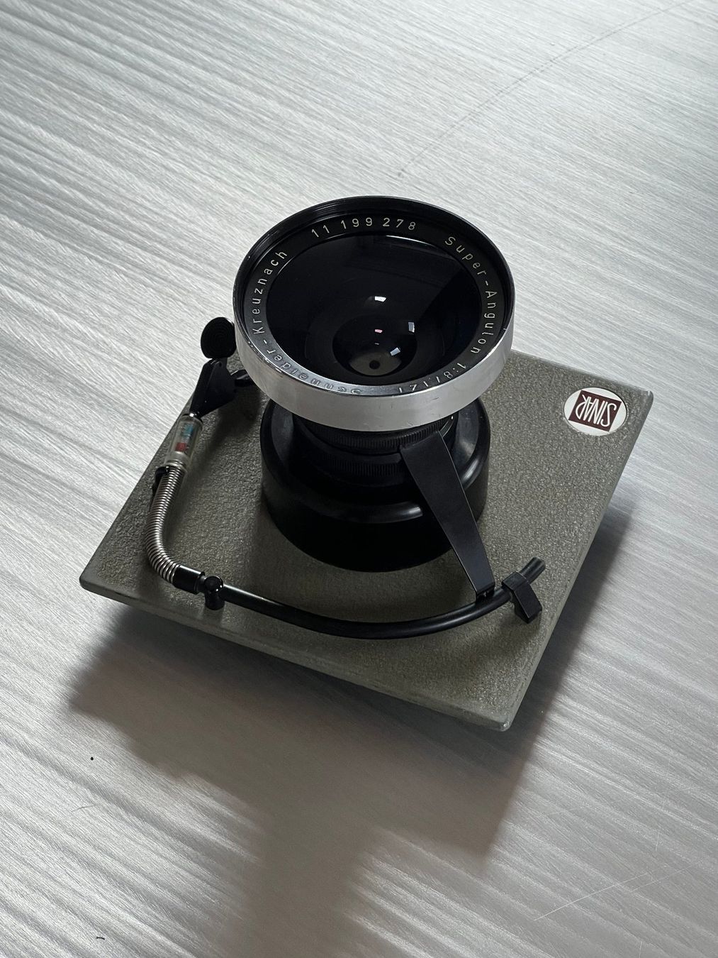 Sinar Fotocamera: SCHNEIDER 121 MM + SINAR DIVERS – Usato da Zürich venduto da Abost
