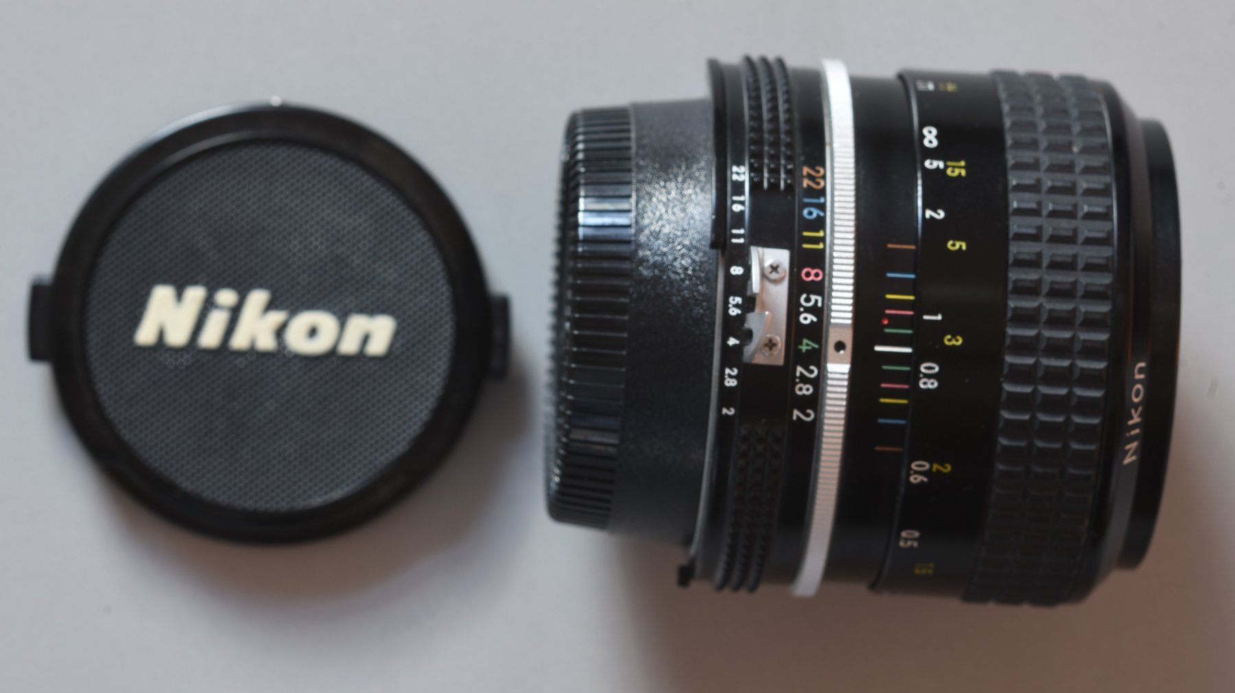 Nikkor Obiettivi: Nikon Nikkor 35mm 1:2 inkl. HN-3 Sonnenblende – Usato da Basel venduto da magicpower99