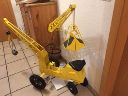Tretauto Kran