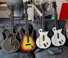 [Cherche] Guitares Guitar Hero (même HS ou sans récepteur)