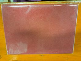 1 Stk.Frottefixleintuch rot mit Nasenschlitz 65x195cm