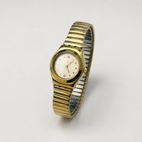Vintage Swatch Damenuhr Gold – Stretcharmband