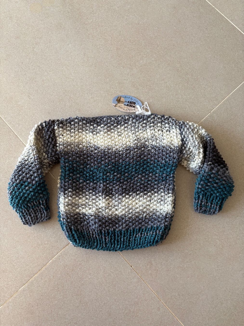 Maglioni & Felpe: Kinder Pullover gestrickt mehrfarbig Grösse 68-74 neu – Nuovo e nell'imballaggio originale da Basel venduto da Tierschutz-Flohmi