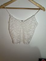 dünnes, weisses, transparentes Top aus Spitze