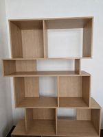 Bibliothèque étagère bois clair design asymétrique 