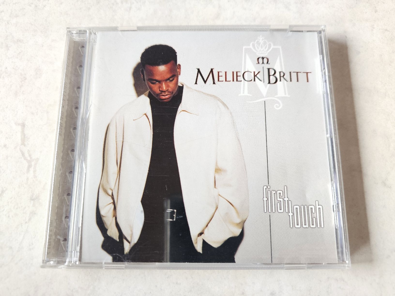 CD: Melieck Britt  -  First Touch – Usato da Schneisingen venduto da backstore24